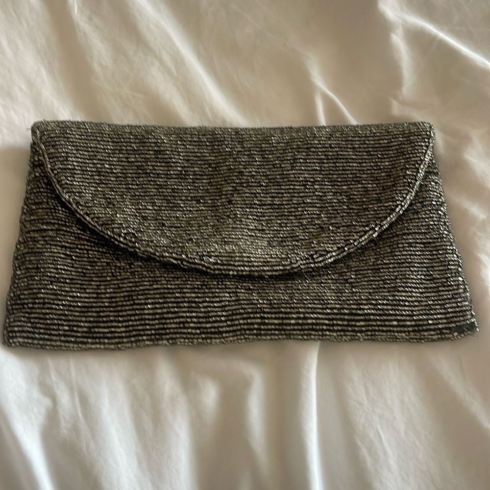 gold and black beaded clutch